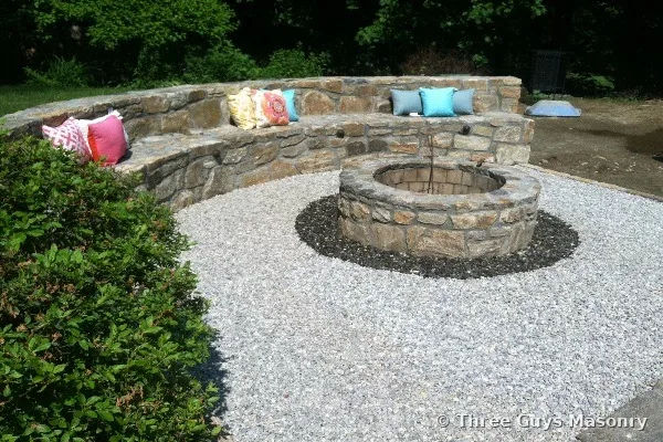 Custom stone fire pit built by Three Guys Masonry